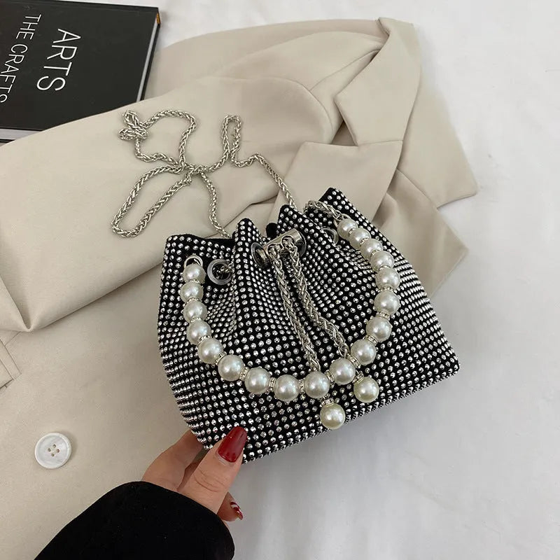 Soft PU leather crossbody bag with diamond embellishments and chain strap in bucket shape