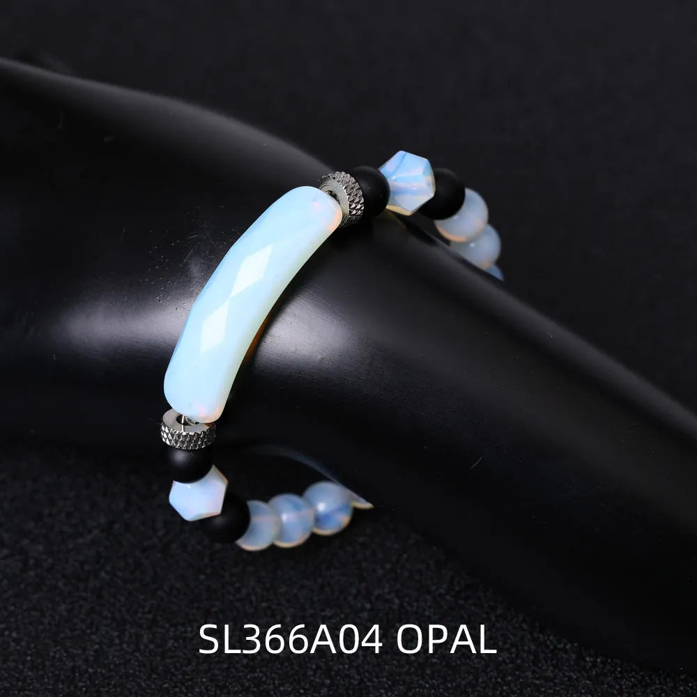 Handmade black agate diamond cut bracelet with geometric fan design on wrist
