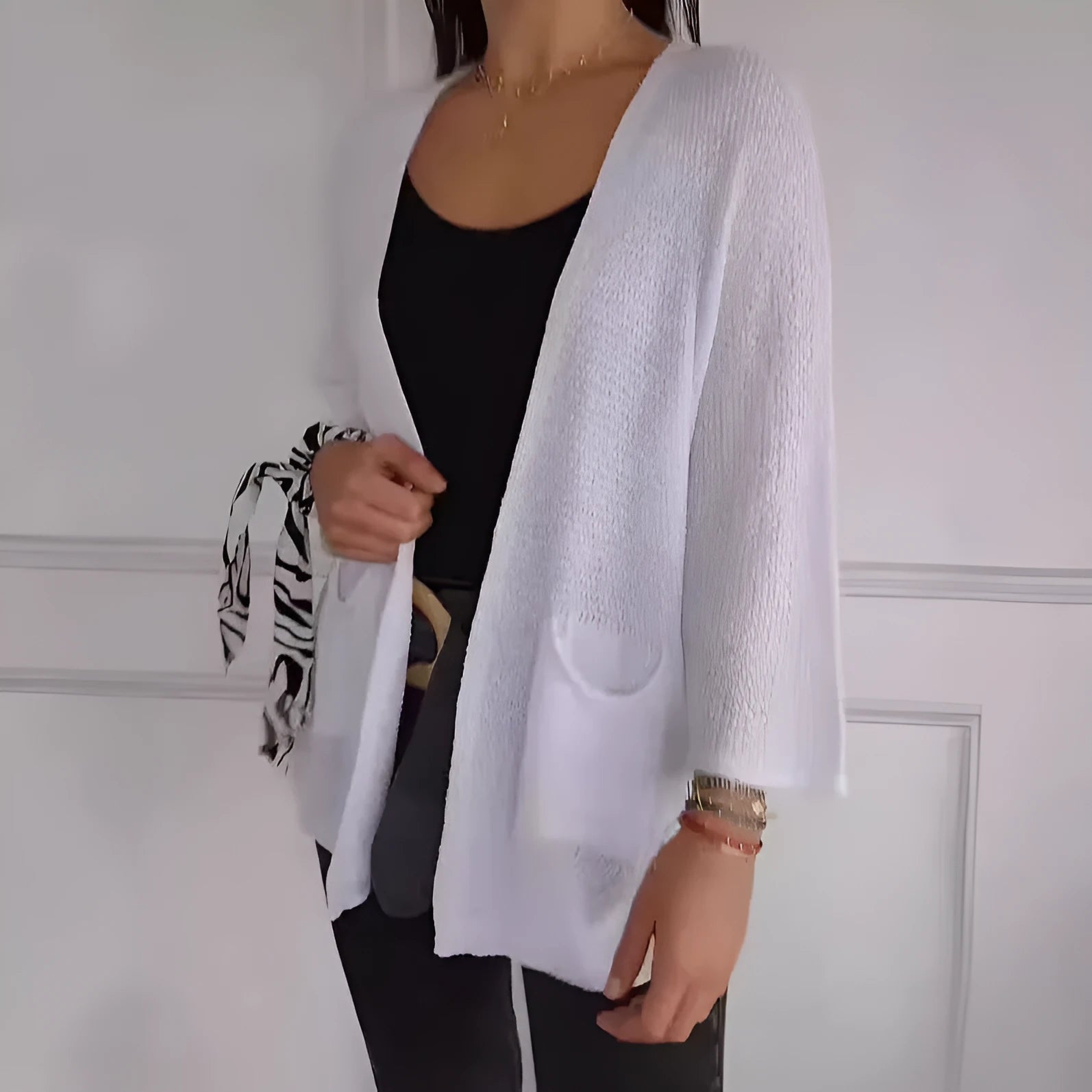 Women's waffle knit cardigan coat with nine-quarter length sleeves and pockets in army green.