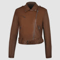 Women's black PU leather motorcycle jacket with lapel collar and short waist belt.
