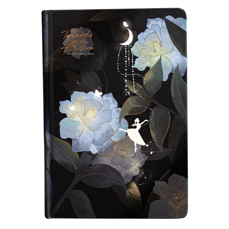 A5 notebook with luminous cover open to show pages filled with colour illustrations