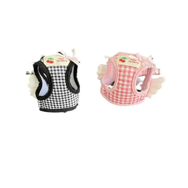 Pink and black cotton chest and back dog harness with hand holding rope in sizes XS to 2XL.