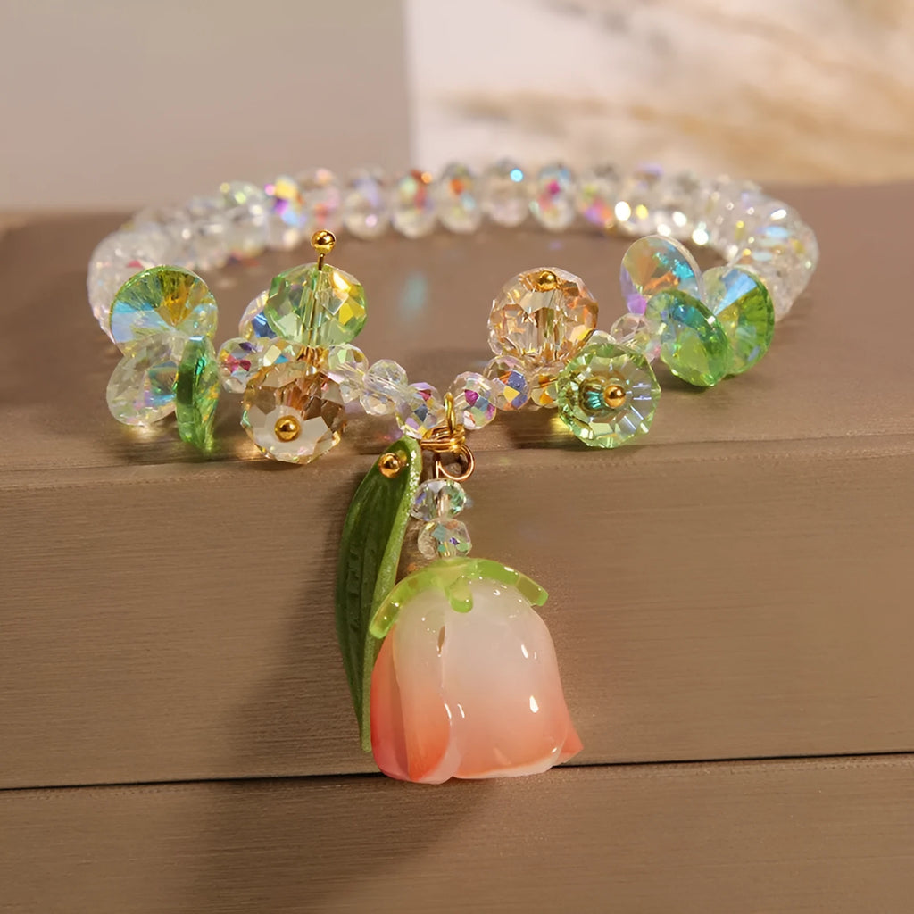 Lily Crystal Bracelet in artificial crystal, available in four colour options: pink, blue, rose red, yellow