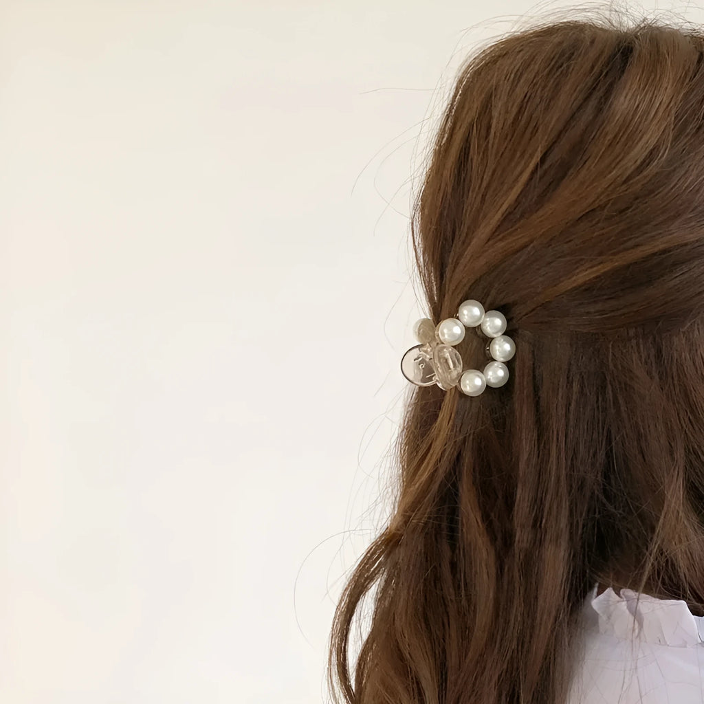 Women's pearl hair barrette in big pearl colour, manual finish, front view