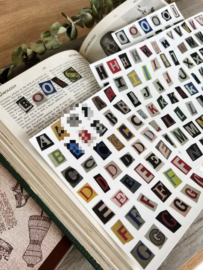 Decorative English letters and numbers sticker collection with weekday words for journaling and craft projects