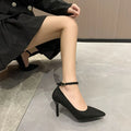 Women's black stiletto heel pump shoes with buckle detail and skull pattern