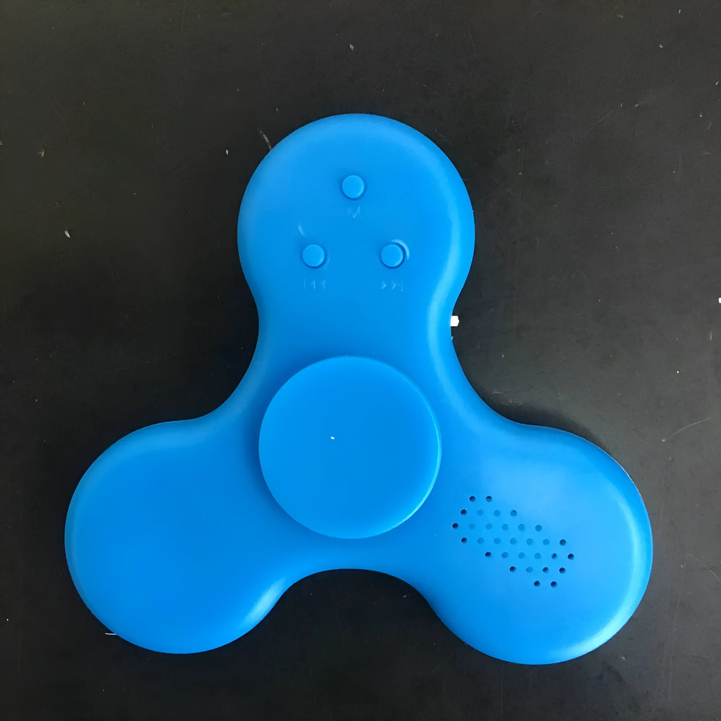 Bluetooth speaker music fidget spinner EDC toy in white, showing portable ABS build