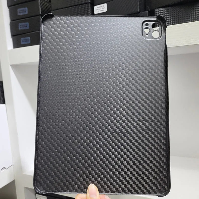 Genuine carbon fibre flat protective cover for Apple iPad Pro 11 with embossed plaid pattern.