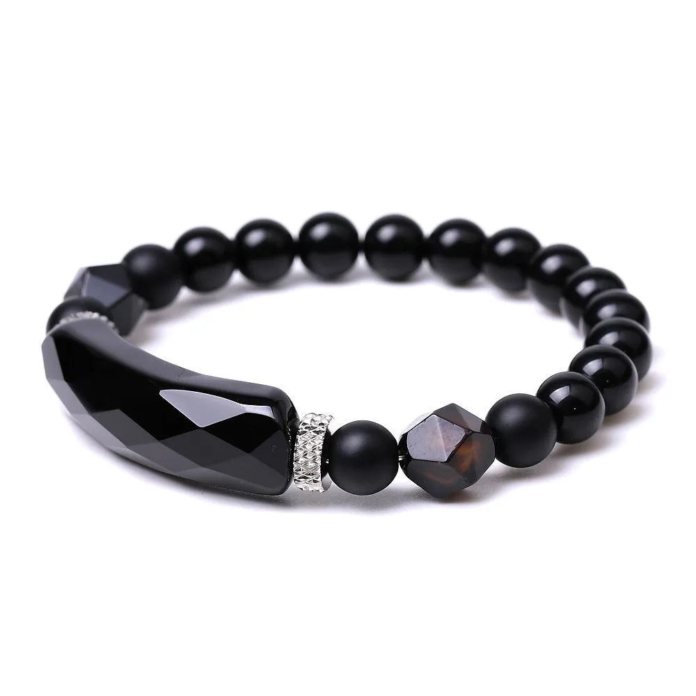 Handmade black agate diamond cut bracelet with geometric fan design on wrist