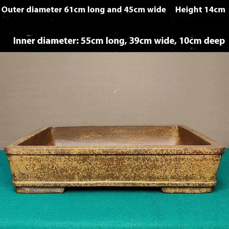 Straight shallow rectangular Yixing Zisha flowerpot made of purple sand clay.