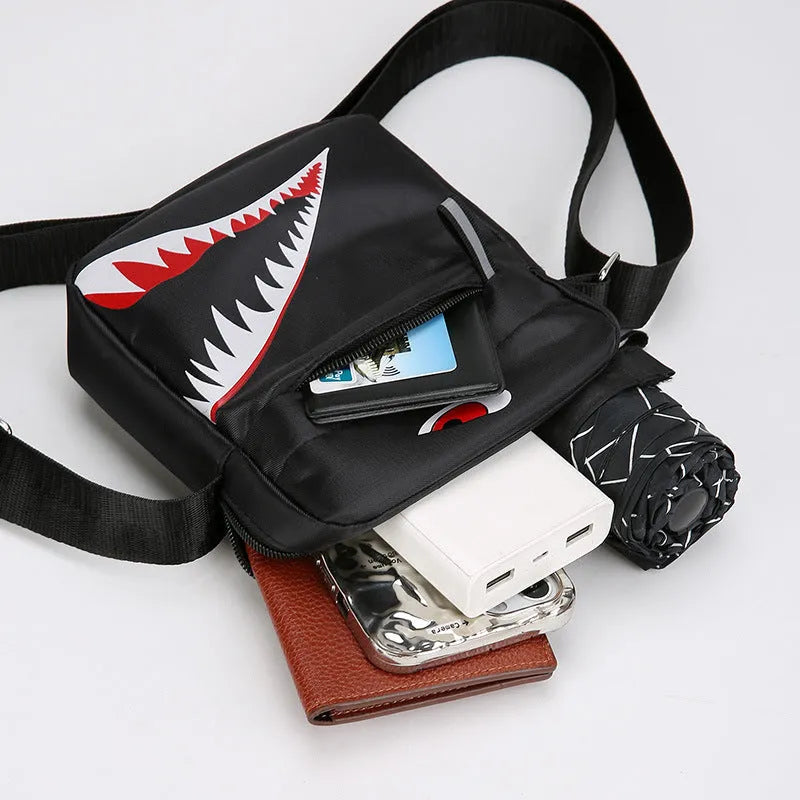Men's small black Oxford cloth crossbody bag with animal pattern print