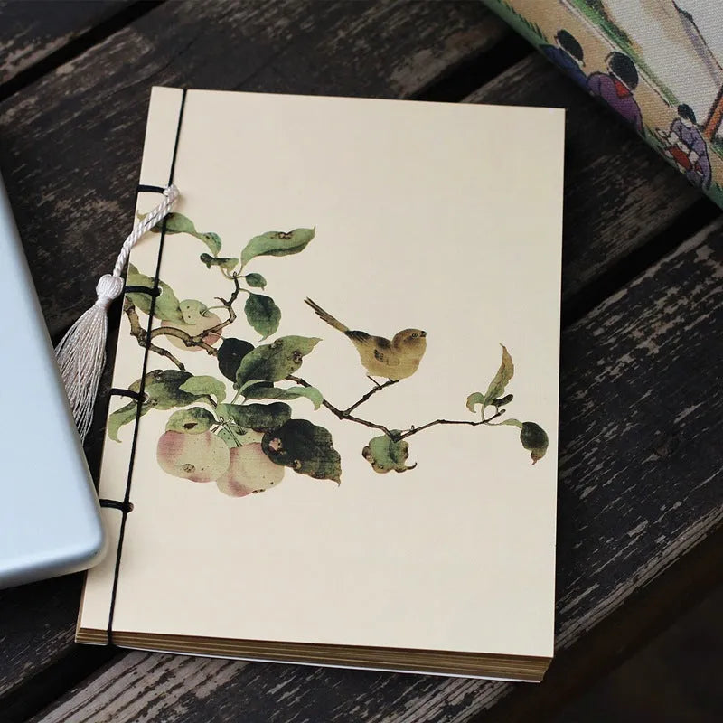 Retro antique wire-bound ledger notebook with embossed cowhide cover and decorative tassels