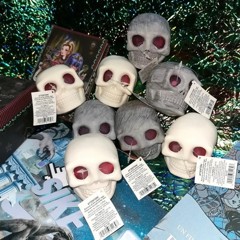 Grey Halloween pinch music decompression ball with skeleton monster face on white background