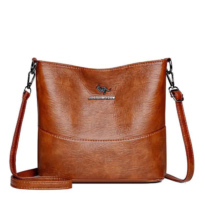 Women's soft leather shoulder bag in bucket style with large capacity and minimalist design