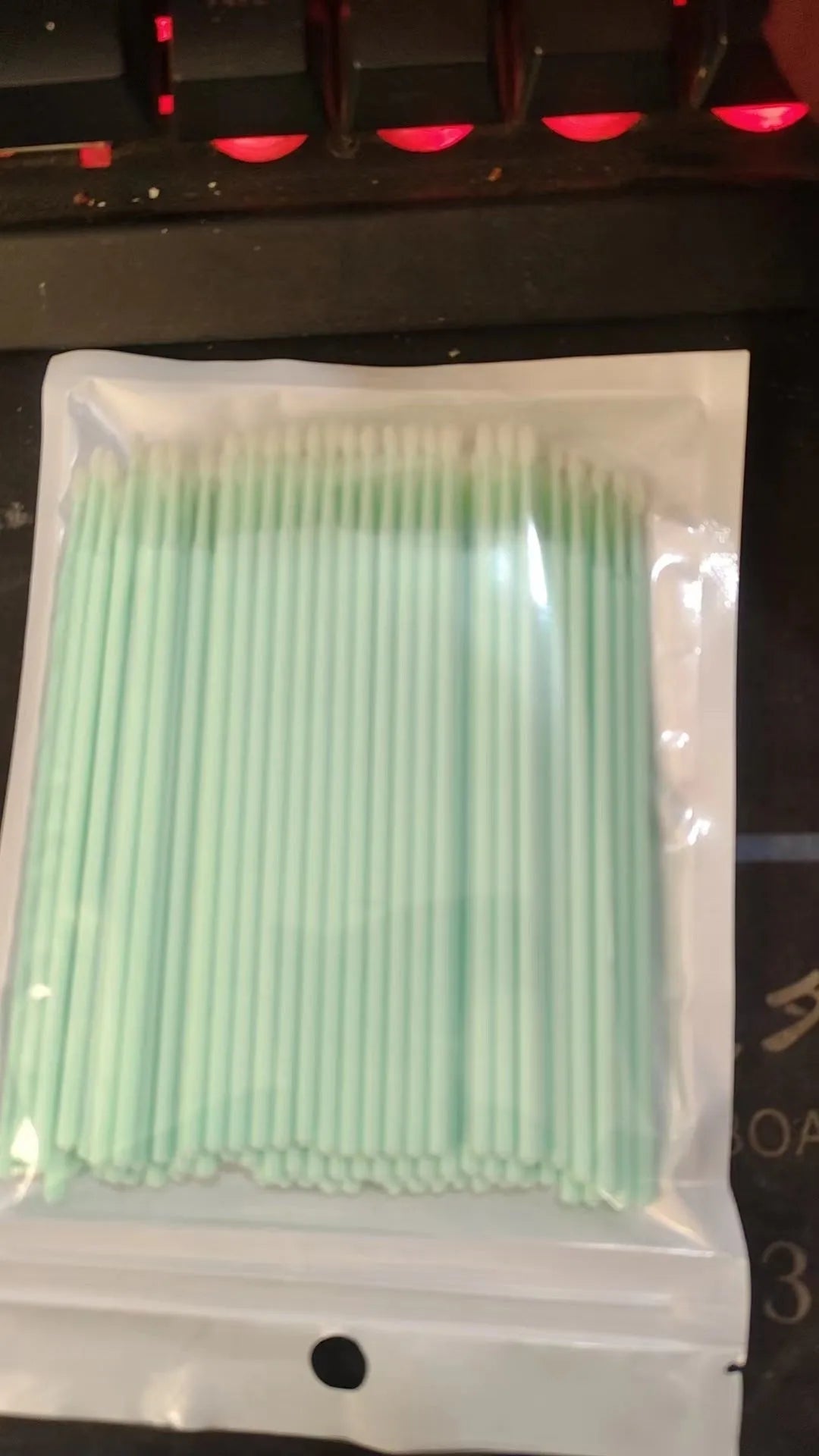 Disposable micro applicator brushes with colourful handles and bendable cotton swabs for makeup and eyelash extensions