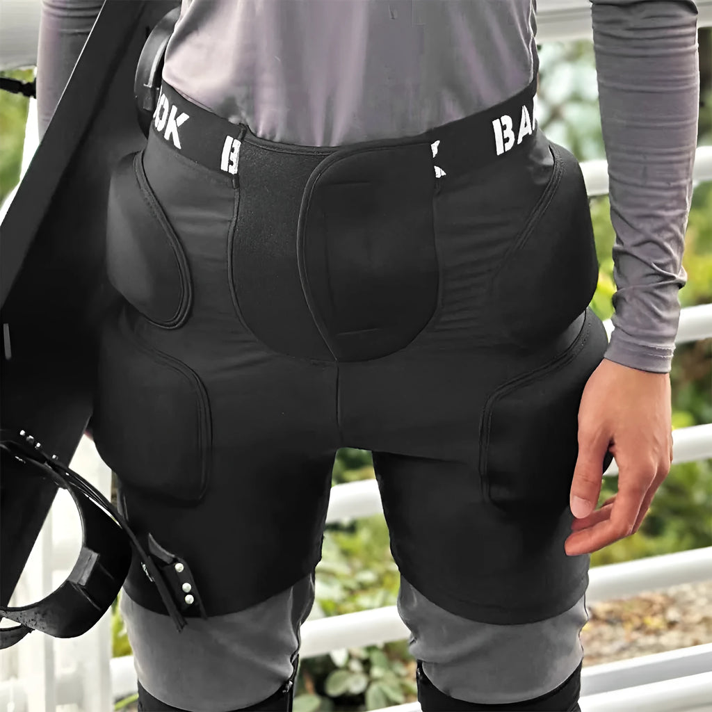 Black adult hip protection pad with NBR foam panels for roller skating and skateboarding