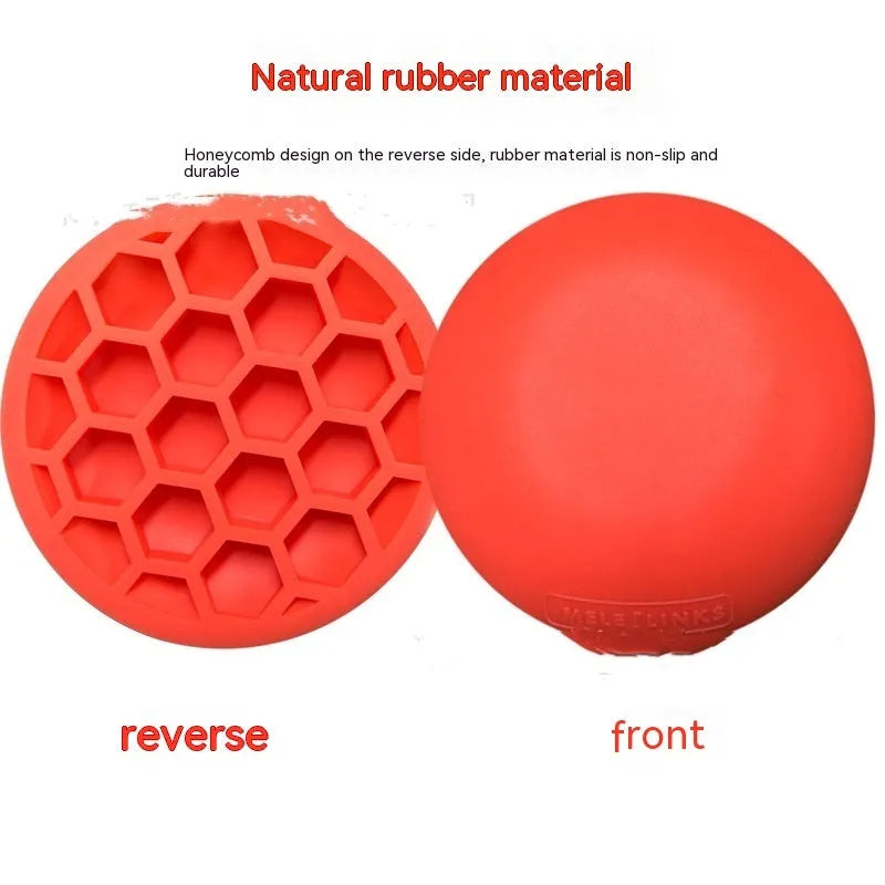 Orange natural rubber golf strength training mat with weighted centre section for swing practice
