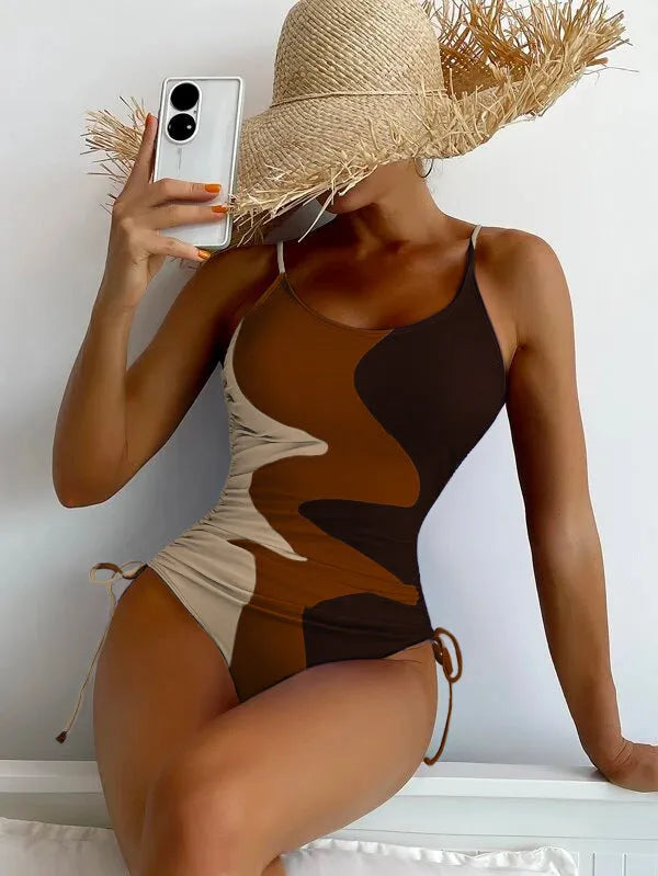 Women's sleeveless one-piece swimsuit in blue, purple, brown, or green colours for swimming sports