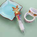 Christmas mini four-colour press-action ballpoint pen with festive designs measuring 11 cm.