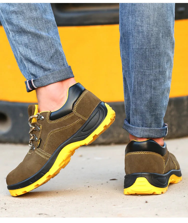 Bronze-coloured leather safety shoes with a steel toe cap and textured anti-slip sole.