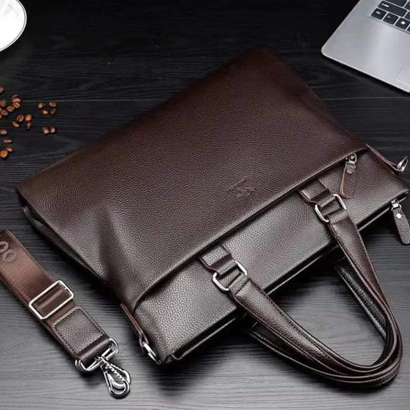Black PU leather men's messenger shoulder bag with splicing design, 35x30x4cm.