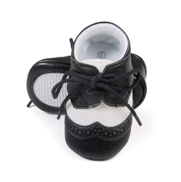 Vintage style baby soft sole walking shoes in synthetic leather available in multiple colours