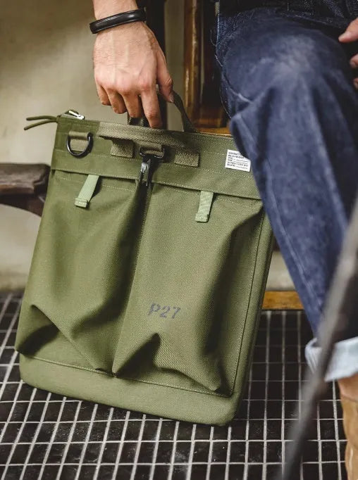 Retro style canvas crossbody messenger bag in charcoal black with zipper closure and shoulder strap