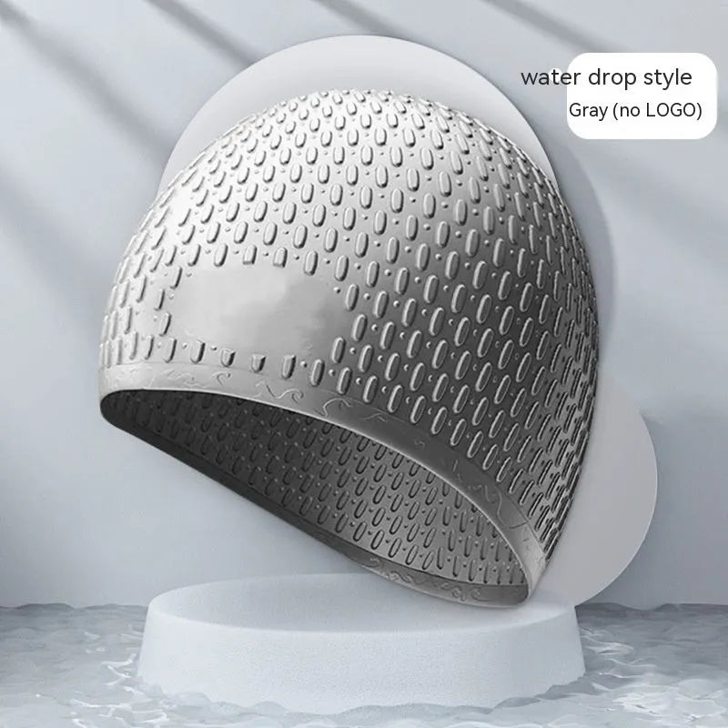 Solid colour silicone swimming cap for adults in one of nine available colours.