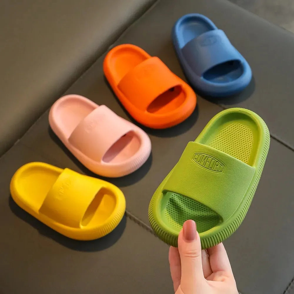 Children's EVA slippers in bright colours with non-slip soles, showing size options from 15.5cm to 21.5cm
