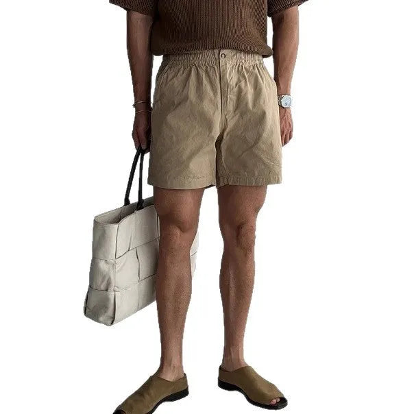 Cotton loose fit sports shorts in black, white and khaki colours