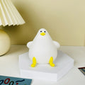 Cute cartoon silicone seagull night light USB rechargeable with soft glow on bedside table