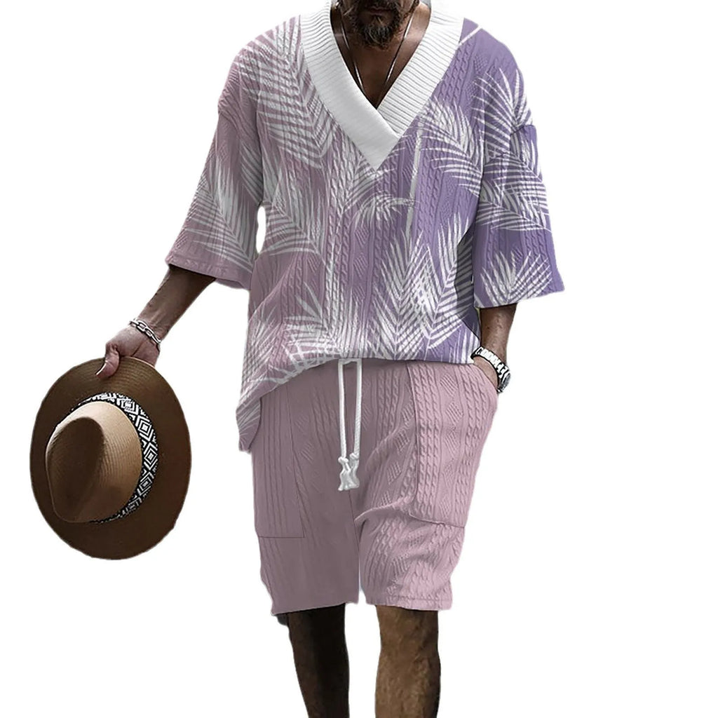 Men's printed drop-shoulder knitted short-sleeved top and matching shorts suit in a polyester blend fabric.