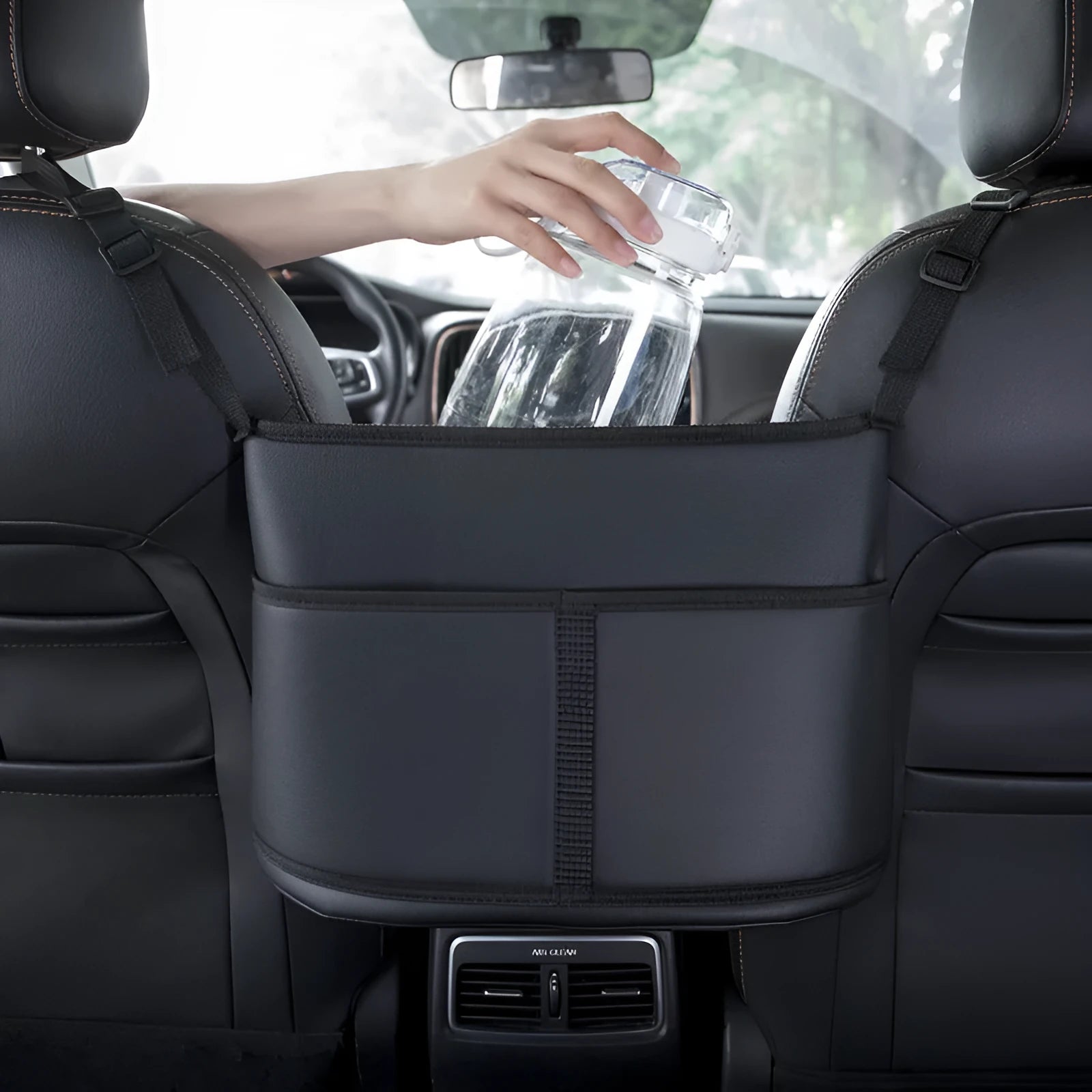 Black leather car seat storage bag with carbon fibre pattern measuring 38cm for centre console organisation