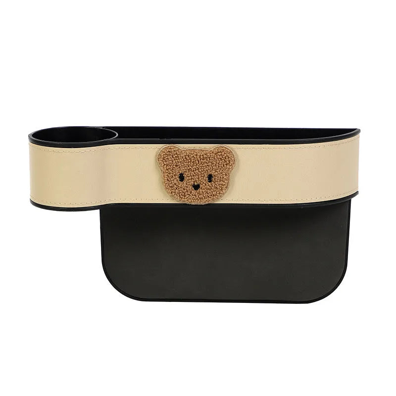 Leather car seat gap storage box with cartoon bear design in black or beige filling the console gap