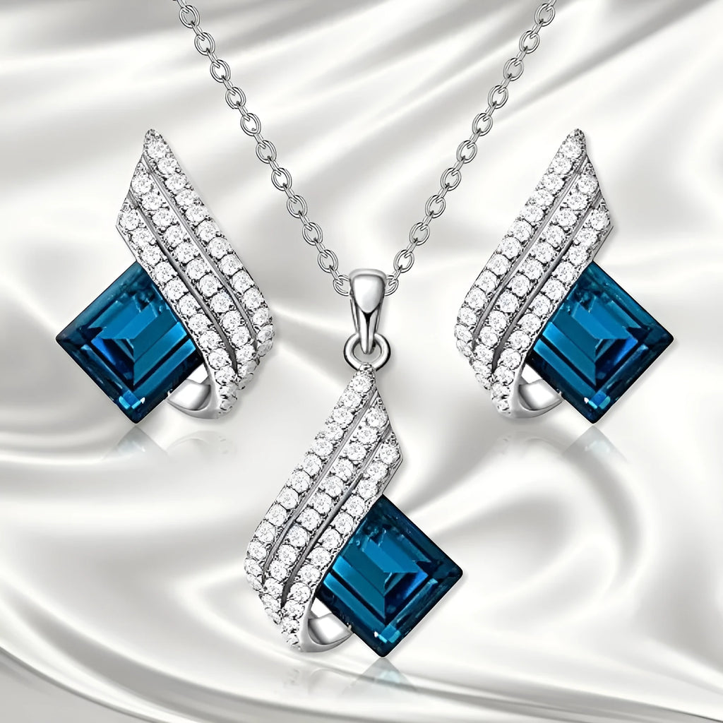 Women's electroplated necklace and earring set with cross chain design and glass pendant