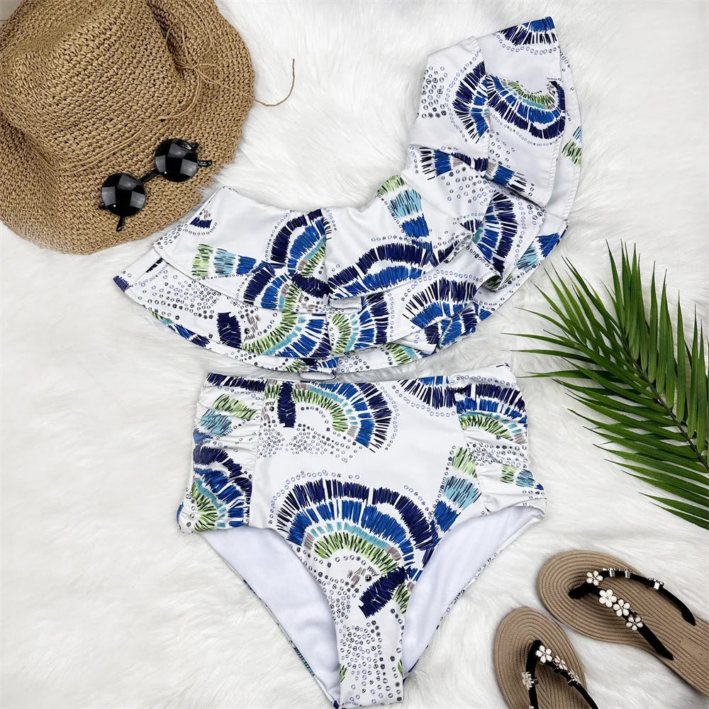 White women's one-shoulder swimsuit with double-layer lotus leaf design and high side leg split