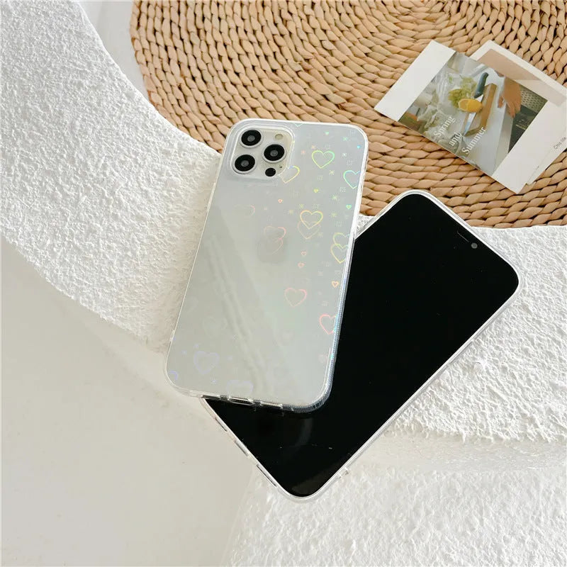 Transparent silicone iPhone case showing laser colourful love heart design on back