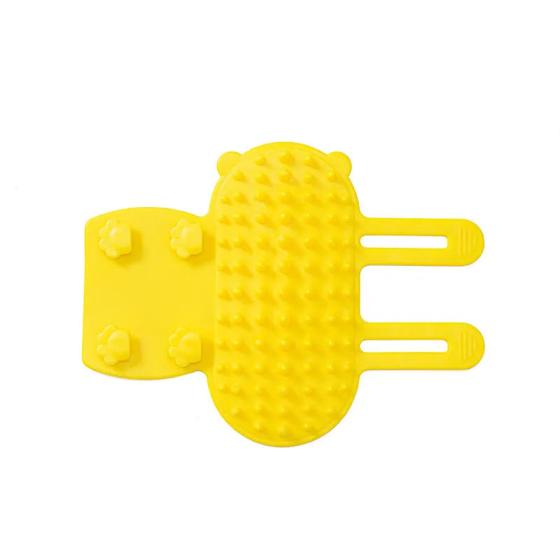 Silicone cat grooming massage comb with rounded teeth and adjustable mounting strap in assorted colours