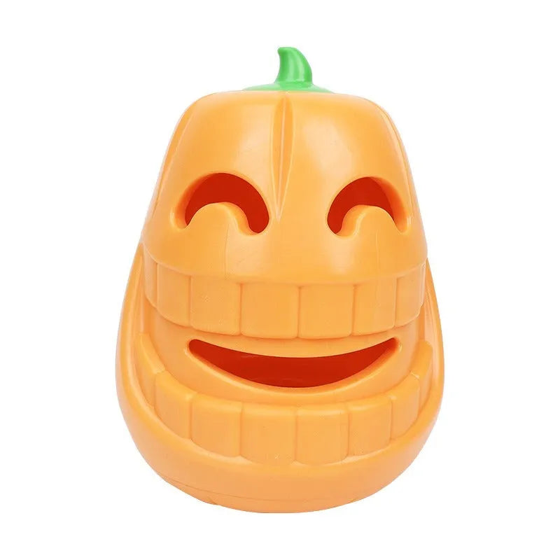 Orange Halloween pumpkin shaped dog chew toy with a treat-dispensing funnel hole.