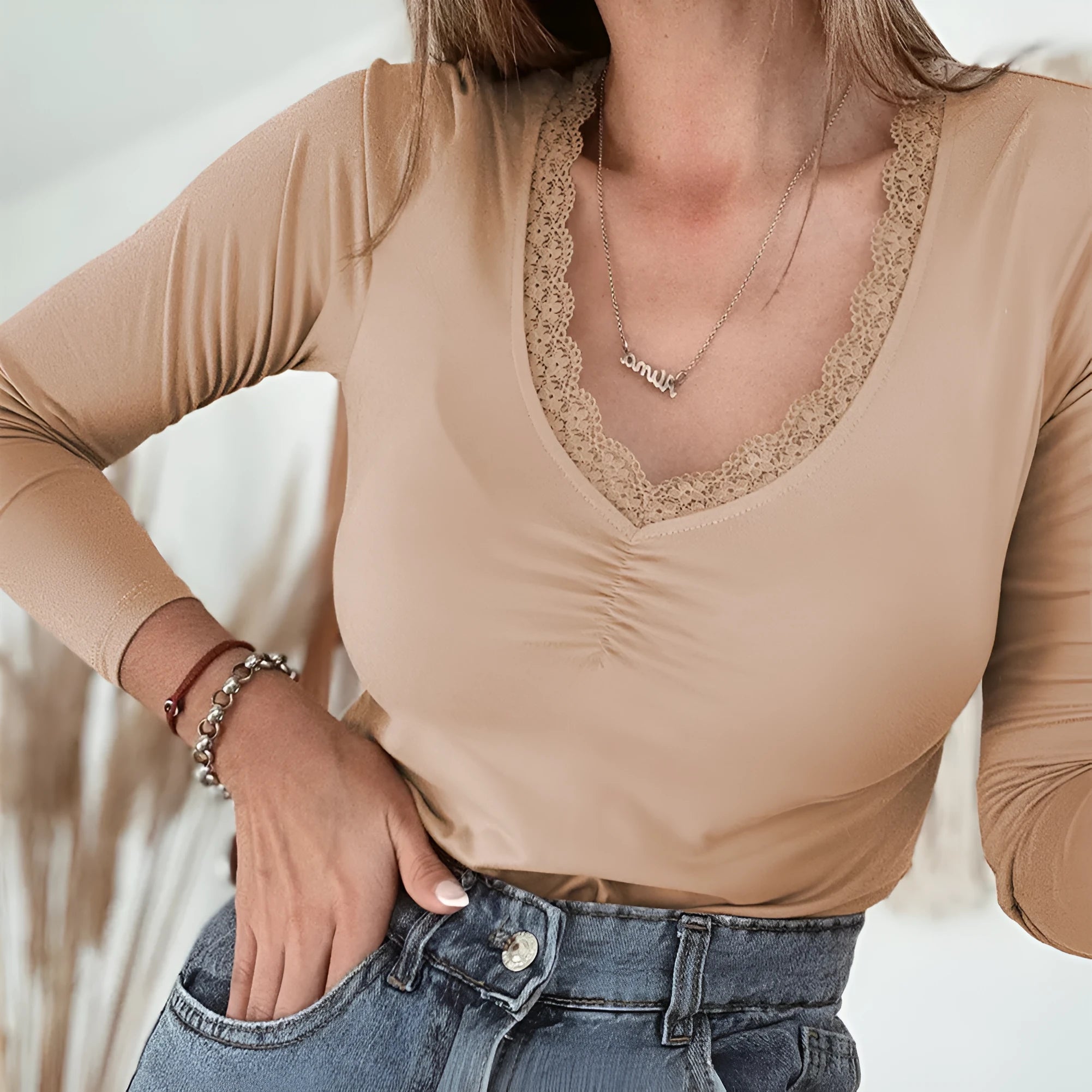 Women's red long sleeve casual top with lace trim detail on neckline, slim fit design