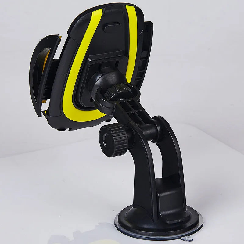 Red ABS car phone holder with U-shaped design and suction cup base on a vehicle dashboard