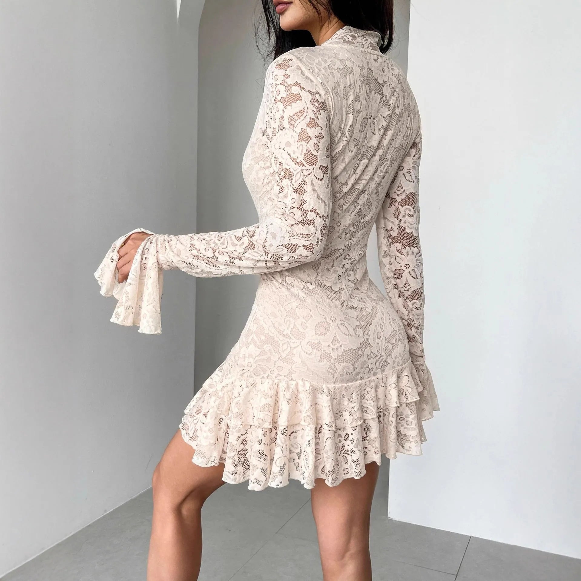 Apricot lace V-neck mermaid dress with floral print and flared sleeves on a mannequin