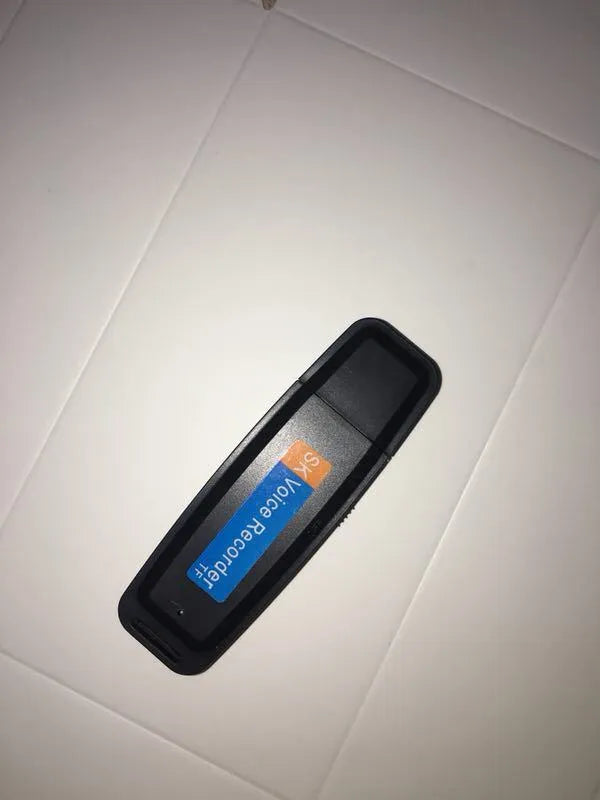 SK-001 black and white USB flash drive with voice function showing compact size