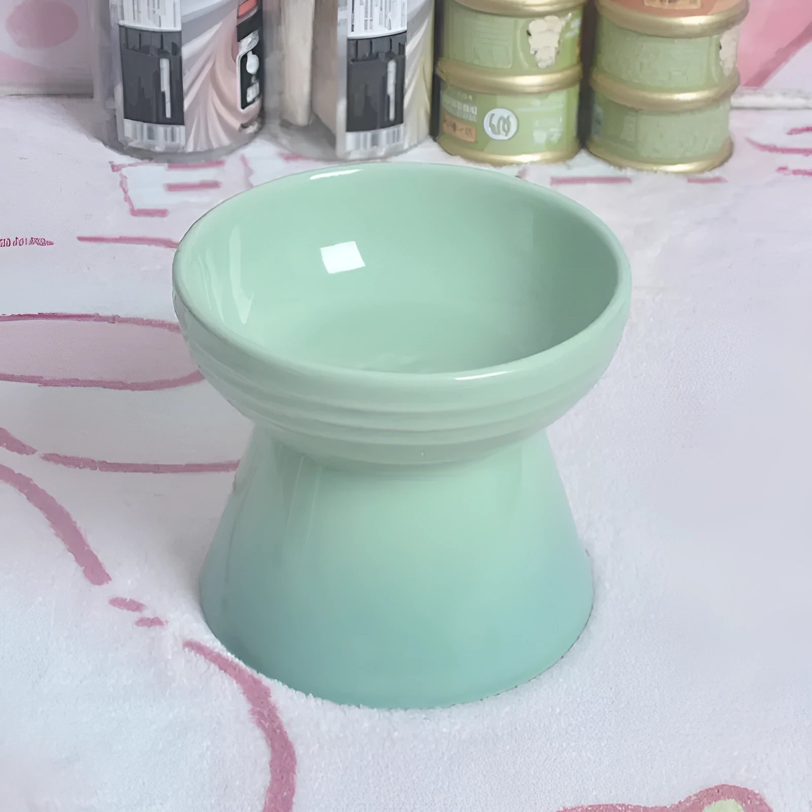 Ceramic pet bowl with high foot design showing anti-tumble stability feature
