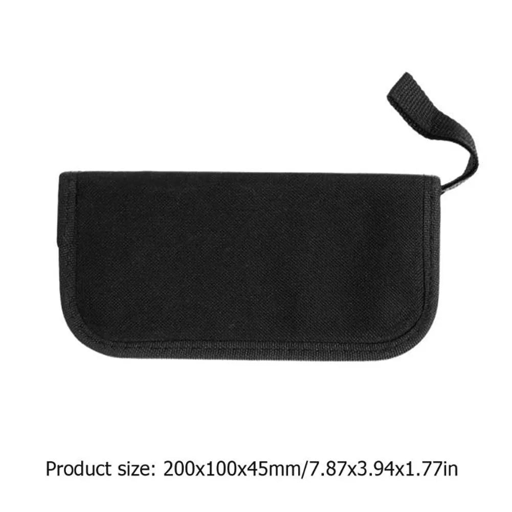 Black plastic and metal guitar repair tool kit for guitar, bass, mandolin, banjo maintenance.