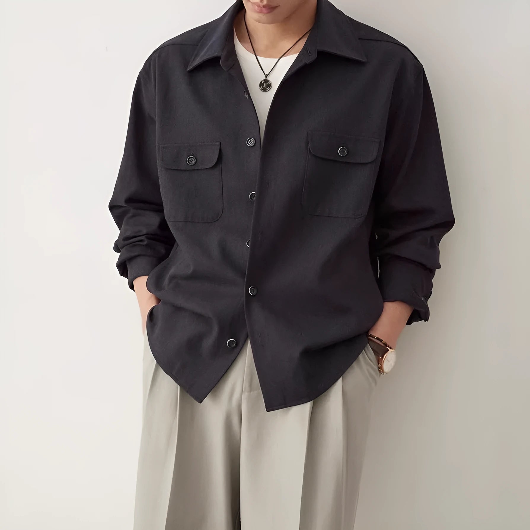 Men's light sand rice casual shirt with a lapel collar and long sleeves.