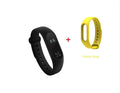Black Xiaomi Mi Band 2 fitness tracker with OLED screen on an adjustable wrist strap