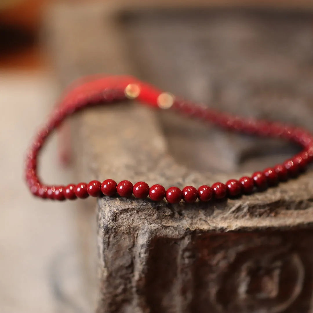 Natural cinnabar bracelet with purple gold sand design and geometric auspicious patterns
