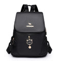 Women's PU leather backpack in black, blue, or taro purple with three-dimensional pockets