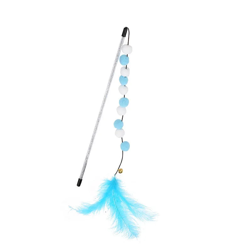 Colourful cat teaser toy rod with bell and pompon feather attachment on grey background